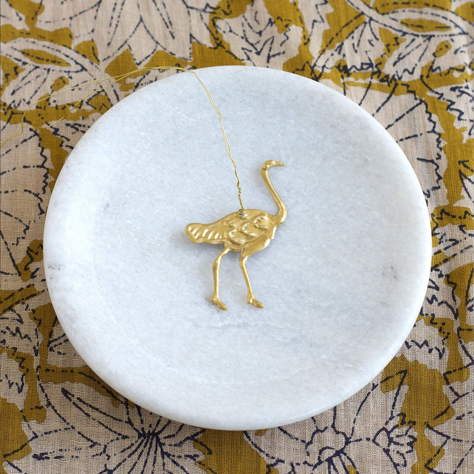 Handgemaakt ornament van De Weldaad – struisvogel van messing